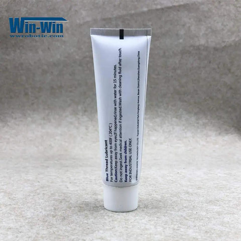 Blue Screw Thread Lubricant For Water Jet Spare Parts, High-Pressure Goop That Keeps Threads Slick, Easier Disassembly And Reassembly, Marine And Industrial Grade, Part Number A-2185, Blue Colloid Lubricant For Quick Maintenance on white tube