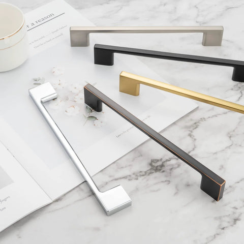 Wide Foot Cabinet Bar Pull In Matte Black 5 Inch 128mm Screw Spacing Solid Metal Hardware, shown with other finishes on marble surface