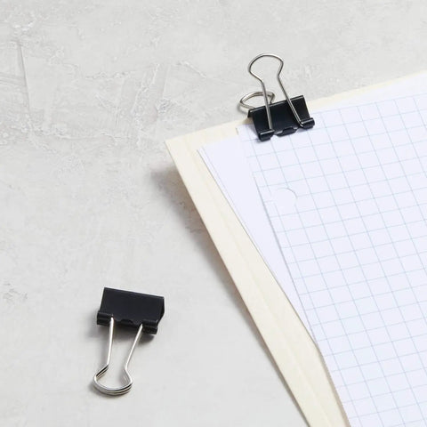 Sturdy 0.75 Inch Binder Clips For Papers And School Projects, Heavy Duty Steel With Extra Strong Grab shown securing documents