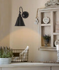 Swing Arm Wall Lamp Set 2 Pack Dope Rustic Vintage Sconce Lighting in a farmhouse setting with black finish and wall decor