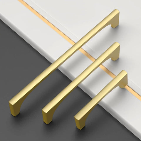 Top Notch Brushed Gold Cabinet Pulls 10 Pack 5 Inch Drawer Handles For Kitchen Cabinets on a counter surface.