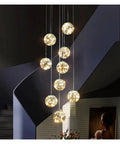 Modern Stair Chandelier Pendant Lights Indoor Lighting Ceiling Lamp for Living Room Indoor Lighting with cascading spherical design.