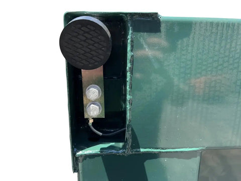 Close-up of Heavy Hitter 40 By 40 Inch Steel Floor Scale metal bracket and padding, highlighting its robust construction features.
