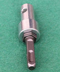 Electric SDS Shank Converter Adapter For Drill Bits And Power Tools on green surface