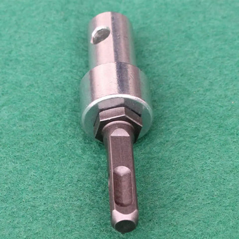 Electric SDS Shank Converter Adapter For Drill Bits And Power Tools on green surface
