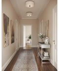 Cool One Light LED Flush Mount Ceiling Light In Graphite Finish, 13 Inch Diameter, 6 Inch Height, installed in a hallway