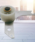 Complete Dryer Idler Pulley Assembly With Bracket For Easy Bolt On Install, Keeps Drive Belt Tension Steady To Preserve Smooth Drum Rotation And Quiet Operation, DIY Friendly Replacement. White plastic pulley with metal bracket