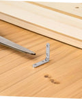 Close-up of 12 Piece Zinc Alloy 90 Degree Miniature Hinges for Jewelry Boxes Cabinets Small Chests and Wooden Cases DIY Crafts