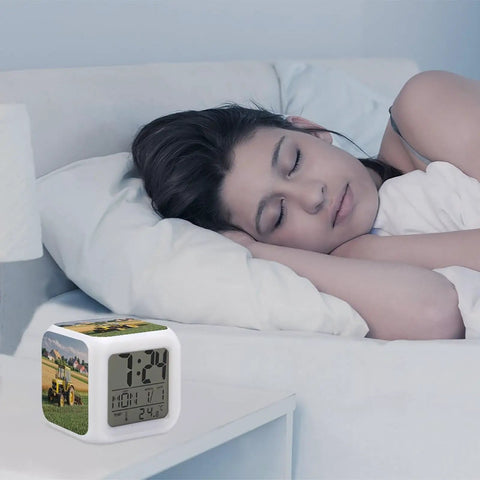 Heavy Sleeper Tractor Alarm Clock With LED Display Super Loud Alarm 7 Color Night Light And Built In Sound Machine on bedside table