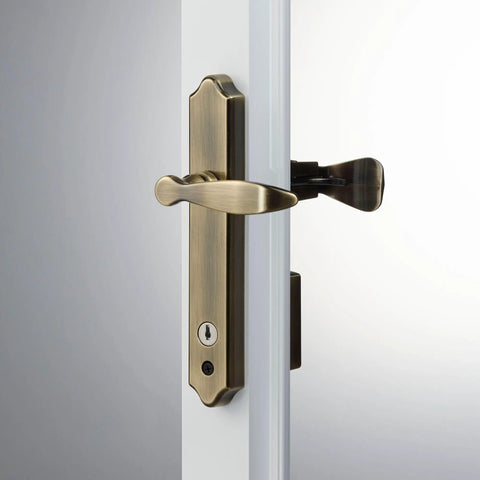 Surface Mount Storm Door Handle With Lock And Key For One To One And A Half Inch Thick Doors In Antique Brass Finish Four Post Lever