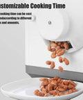 Kick Up Your Home Brewing Game With This Heavy Duty Electric Coffee Bean Roaster Featuring Adjustable Temperature And Timer Settings For Consistently Next Level Flavor, displaying roasted peanuts falling into a white plate.