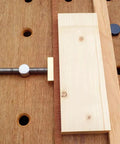 Bench Dog Clamp 3/4 Inch Dog Hole Clamp with stainless steel bench dogs gripping wood on MFT table, showing quick setup and stable work.