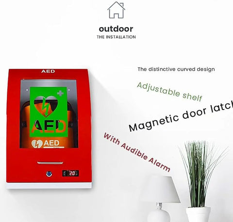 Front view of red wall-mounted AED defibrillator cabinet with glass window, orange AED unit inside, and key lock.
