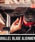 User aligning the blade on a Solid 15 Amp 10 Inch Table Saw featuring kickass precision cuts and rack and pinion fence.