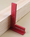 Red Magnetic Machinist Square With Dual Rare Earth Magnets For Hands Free Precision in use on wooden plank