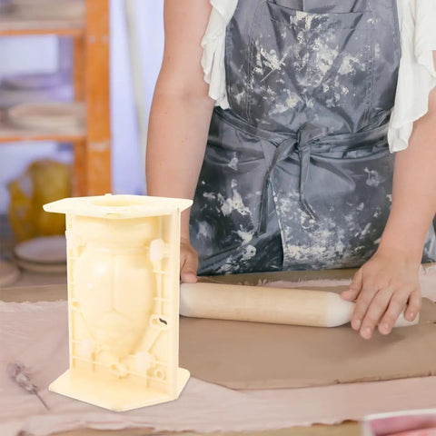 Woman working next to a Roman Column Balustrade Concrete Mold For Easy DIY Baluster Casting 8.26 By 5.90 By 5.51 Inch Plastic Mold
