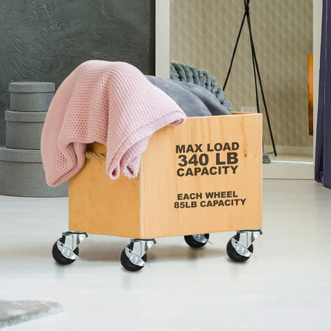 12 Pack 2-Inch Swivel Casters With Brakes for Cart or Equipment, hard rubber wheels, mounted on a wooden crate with blankets