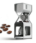 Next Level Electric Ice Drip Coffee Maker And Digital Cold Brew Machine with glass pitcher and coffee beans.