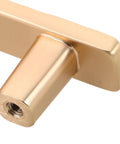 Close-up of a gold zinc alloy cabinet pull handle, showcasing the screw hole detail of the Two Pack Zinc Alloy Cabinet Pull Handles With Screws For Kitchen Cabinets Wardrobe And Dresser Doors Modern Metal Drawer Pulls Hardware Accessories Dope Quality Ready To Install Built To Last.