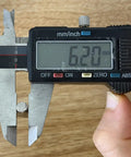 Digital caliper measuring 6.2mm rod, showcasing precision for Heavy Duty Six Point Two Millimeter Shelf Pegs.
