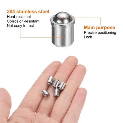 Hand holding 10 Piece Ball Point Spring Plunger Set 6x7mm Stainless Steel for precision positioning and locking.