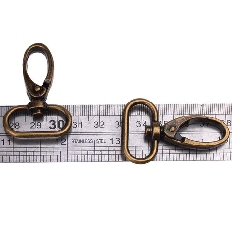 Dead Nuts Sturdy Curved Zinc Alloy Swivel Trigger Clasps For One Inch Webbing Bag Hardware Pack Of Twenty on measuring ruler.