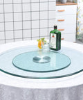 Large Round Lazy Susan Turntable Glides Smooth As Butter Dual Plate Connection Heavy Duty Tempered Glass Serving Tray on dining table.