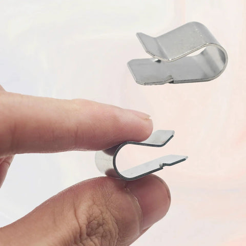 Person holding 30Pcs Stainless Steel Spring U Clips 304 Rust Resistant Built Tough Heavy Duty Fasteners showing size and shape.