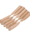 Close up of 50 Piece Pocket Hole Plugs Woodworking Dowel Kit Built Different Softwood Filler Inserts for seamless joints.