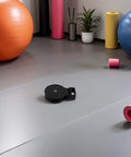 2 Pack Fitness Pulley System With Bearing For Cable Machine Attachments, Gym Pulley Wheel For Home Gym Strength Training, Lifting Roller For Smooth Rolling And Effortless Gains, black pulley on gym floor
