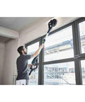 Man using PLANEX LHS 2 225 EQI Plus Drywall Sander With LED Ring Light Arm Friendly Adjustable Suction Power on a ceiling