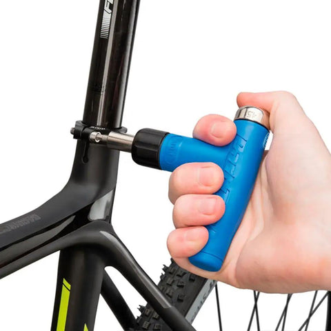 Beefy Adjustable Torque Driver For Bikes With 4 To 6 Nm Settings used on bicycle frame, magnetic bit holder visible.