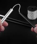 Two Rolls Of 100 Ft 1 8th Inch Shock Cord Tent Pole Repair Kit With Lead Wires And Washers shown with cord and poles