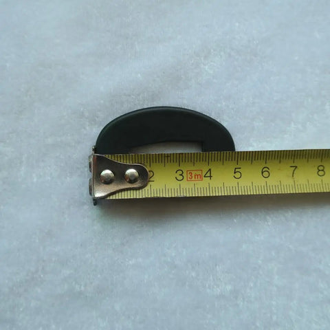 Dope Hand Guard Tsuba For Katana Wakizashi And Tanto Alloy Copper Iron Build next to ruler on white background