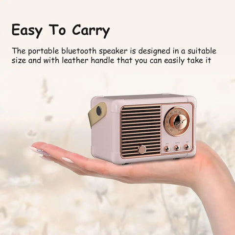Retro Bluetooth Speaker Portable Wireless Speaker With Crystal Clear Stereo Sound And Rich Bass Pink Color held in hand