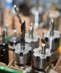 High Precision 13 Piece Spring Collet Set for ER11 Tool Holders 1mm to 7mm Range with 0.0003 Inch TIR shown with drill bits