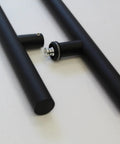 Stainless Steel Round H Shaped Push Pull Door Handles Double Sided Beefy Yet Sleek Commercial Pull For Sliding Doors And Glass Entry Doors Anodized Matte Black Finish 24 Inch Heavy Duty Modern Hardware, black H-shaped door pull close-up