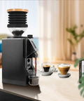 No Sweat Coffee Grinder Chute And Spout Funnel Duo For Standard Espresso Bean Routing with coffee cups on table.