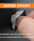 Person peeling adhesive backing from All-In-One Zip Tie Adhesive Mount Kit With 140 Pack Three Quarter Inch Cable Ties, Self Adhesive Cable Management Clips, Wire Clips With Screw Holes, Anchor Stick-On Wire Holders, Black for installation.