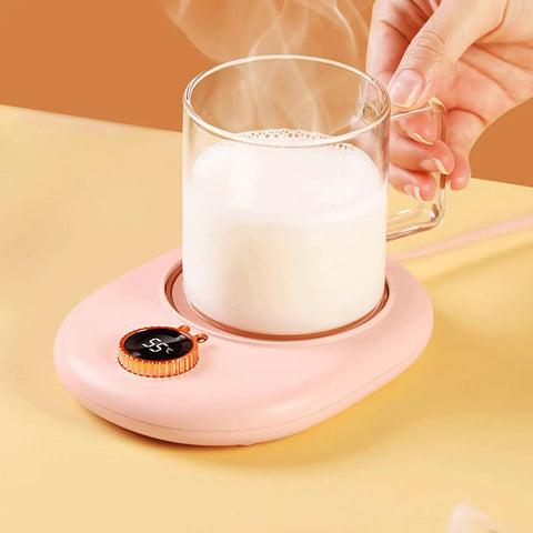 Portable Electric Heating Coaster For Coffee And Tea, 75 Degree Cup Warmer Plate With Hella Steady Temp Dial in pink, holding a steaming cup.