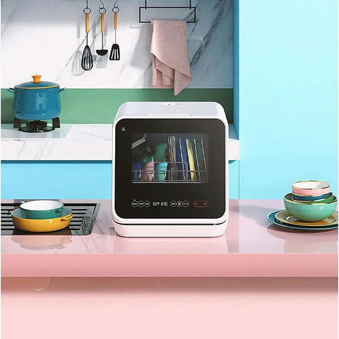Compact Countertop Dishwasher Packs Six Place Settings And Five Wash Cycles To Get Dishes Done Quick Featuring Steam Baby Sterilizer Auto Air Dry And Smart Led Interface Ideal For Tight Apartments in a colorful kitchen.