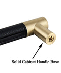 Close-up of Brushed Satin Gold Bar Cabinet Handle With Black Leather Upholstery 8.5 Inch Overall Length, showing solid base.
