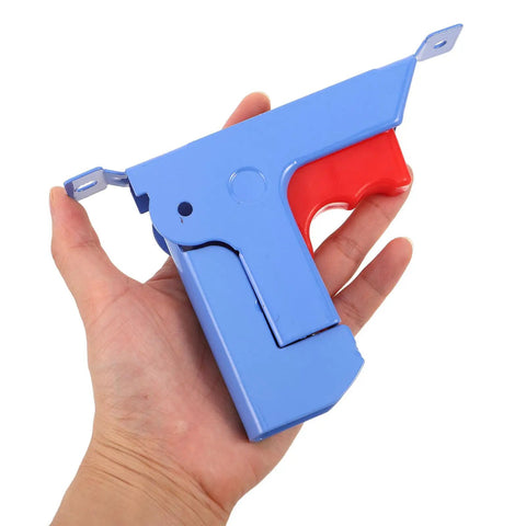 Hand holding a Folding Bed Rail Button Connector With No-Fuss Quick Release Clip, heavy-duty metal safety lever in blue and red.