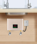 3000W Electric Tankless Water Heater With LED Display And Instant Hot Flow under sink with digital screen and pipes.