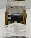 Heavy Hitter 600 Amp Circuit Breaker Trip Unit With 3 Pole Layout And 600 Volt Ac Specs in cardboard packaging with instruction manual.