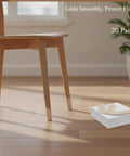 Self Adhesive Silicone Floor Protectors For Furniture Legs That Let Chairs And Tables Glide Smoothly Across Hardwood Tile And Laminate Floors While Preventing Scratches No Scratch Drama 3.3 By 1.5 Inches 20 Count showing a chair leg with silicone pads on hardwood floor