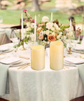 Set Of 3 Waterproof LED Flameless Pillar Candles With Timers For Outdoor Vibe 4 Inch 5 Inch And 6 Inch Tall Up To 1000 Hours Battery Life Flickering Battery Operated Outdoor Pillar Candles For Patio Garden And Festival Decor on a decorated table