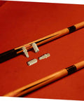 Heavy Duty Copper Pool Cue Extension Screws Four Pack on billiard table near pool cues for cue repairs.