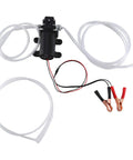 Heavy Duty 12V Auto Car Oil Extraction Pump Kit For Quick Mess Free Fluid Siphon Transfer Scavenge With Efficient Motor And Easy Clean Design, components view with hoses and clips.