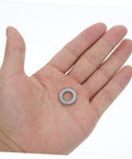 Built Tough Manganese Steel Wedge Locking Washers Heavy Duty Anti Loosening Hardware For Machinery And Construction Vibration Resistant Bolt stabilizer in hand.